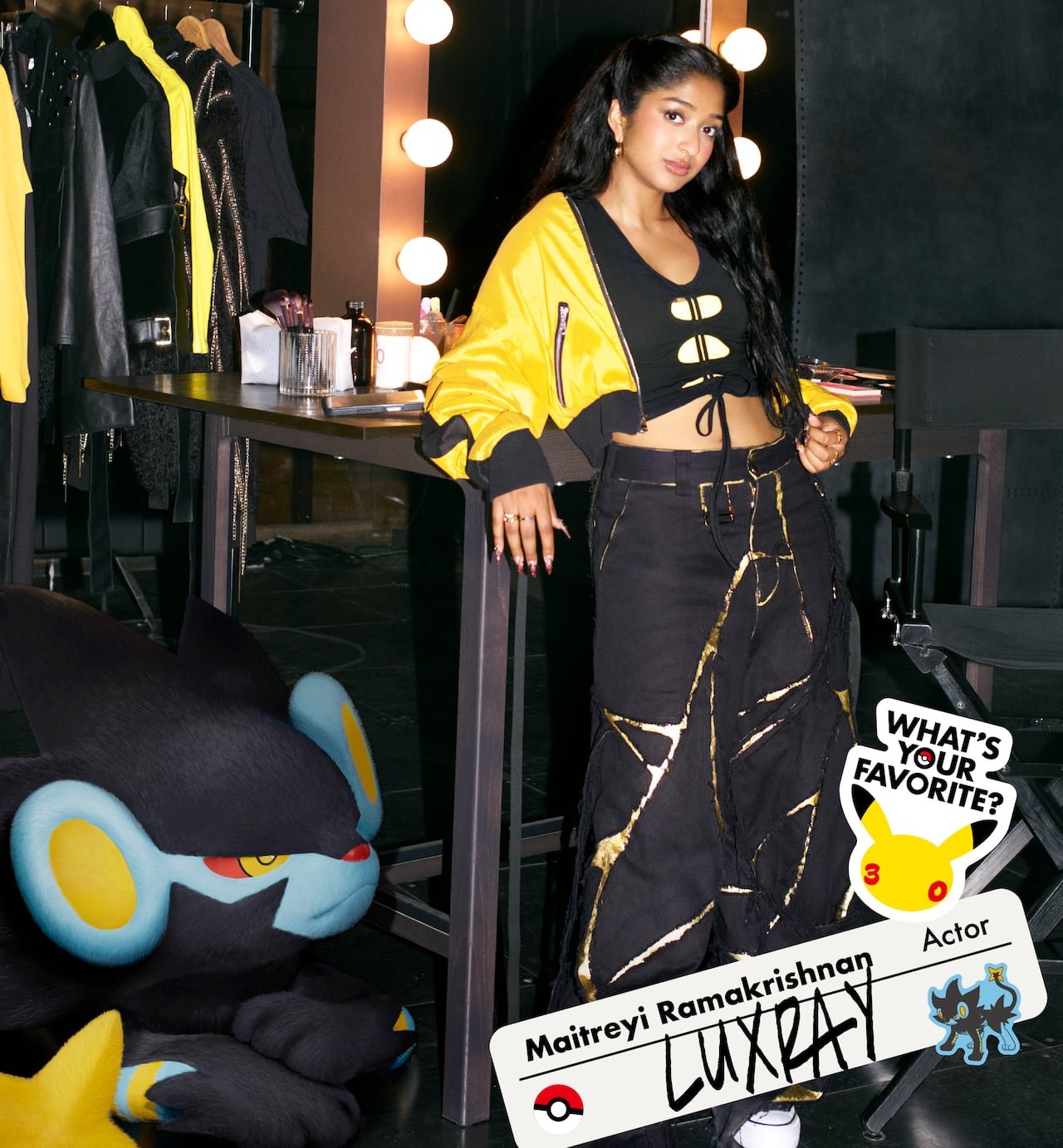 A woman stands in front of a mirror with a cartoon Pokemon in the picture.