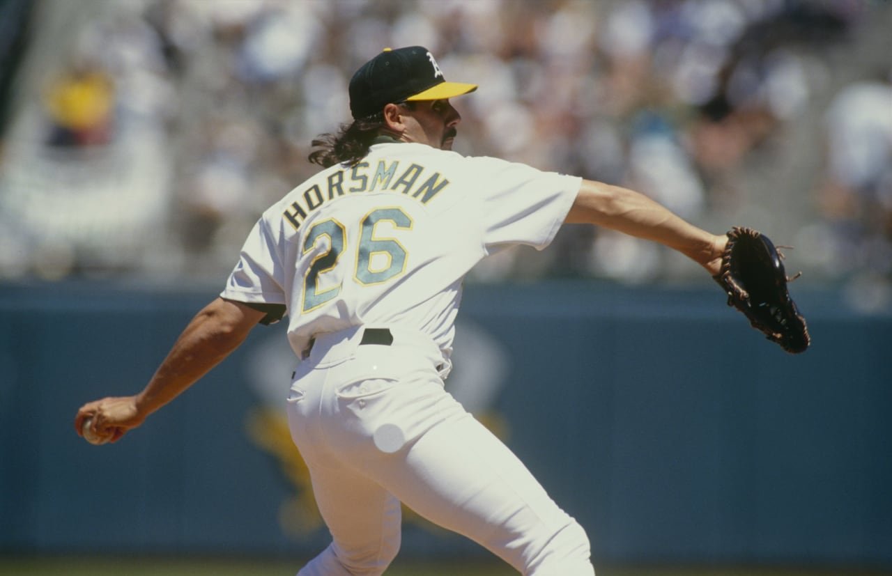 A left-handed pitcher throws.