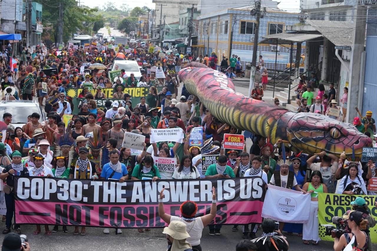 Activists march at a climate protest during the COP30 U.N. Climate Summit, Monday, Nov. 17, 2025, in Belem, Brazil.